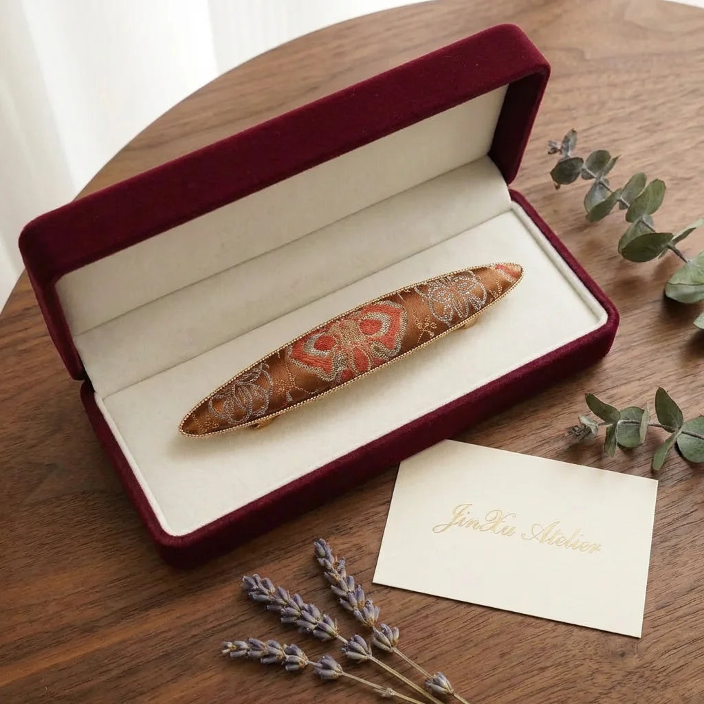Terracotta Shu Brocade Elongated Boat Barrette — JinXu Atelier gift box burgundy velvet packaging Chengdu artisan
