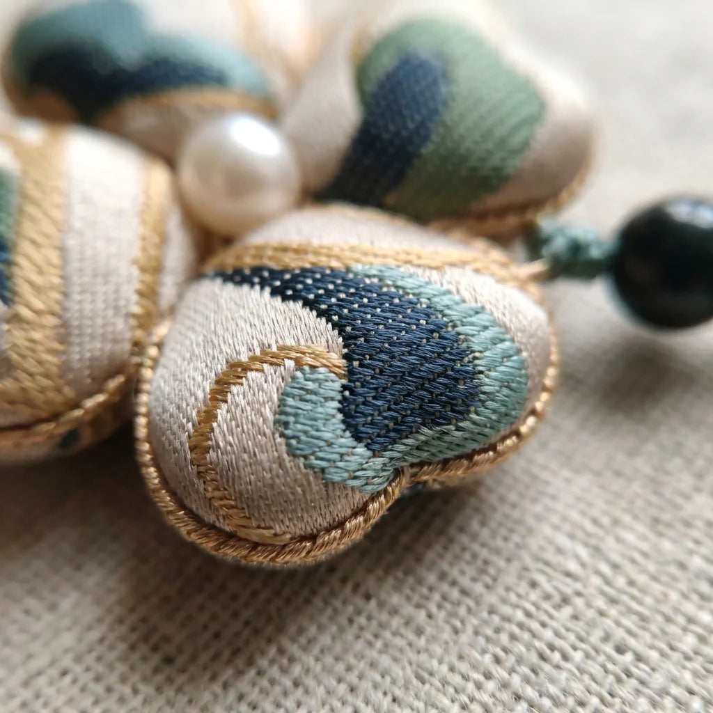 Clover Silk Brocade Phone Charm — Sage Blue silk weave TEXTURE close-up detail