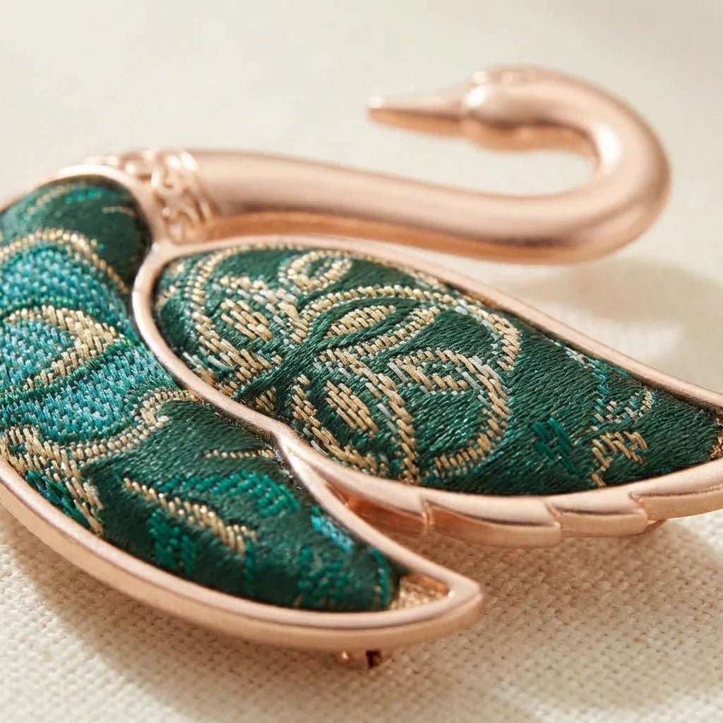 Emerald Green Shu Brocade Swan Brooch texture close-up — silk weave detail