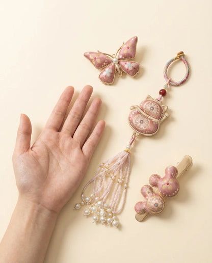 Pink Shu Brocade Gift Set size reference — hand scale 3 piece collection