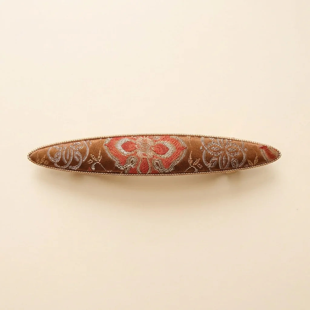 Terracotta Shu Brocade Elongated Boat Barrette — ivory background handcrafted Chengdu
