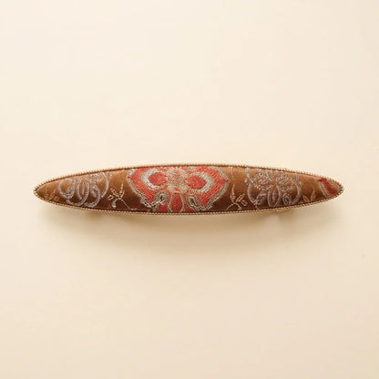 Terracotta Shu Brocade Elongated Boat Barrette — ivory background handcrafted Chengdu