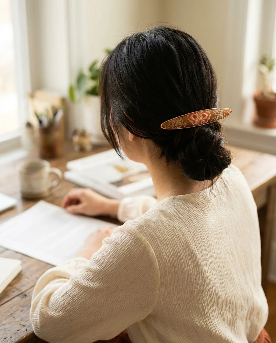 Elongated Boat Terracotta Shu Brocade Barrette in low chignon — lifestyle