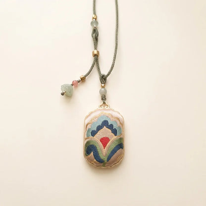 Shu Brocade Rectangular Pendant Necklace — Cloud Motif ivory background HERO handcrafted perfected
