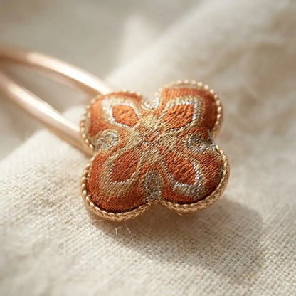 Clover Silk Brocade Snap Hair Clip — Terracotta 45 degree weave TEXTURE close-up detail