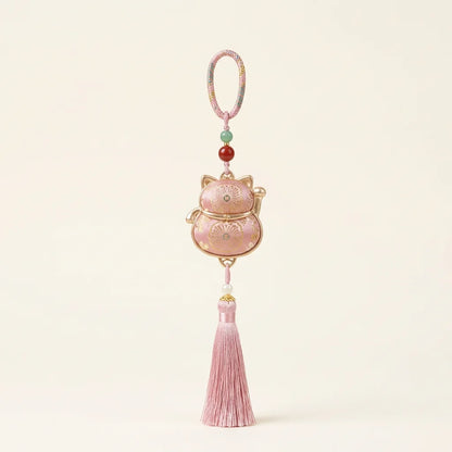 Pink Lucky Cat Fortune Knot Tassel Charm — ivory background HERO handcrafted