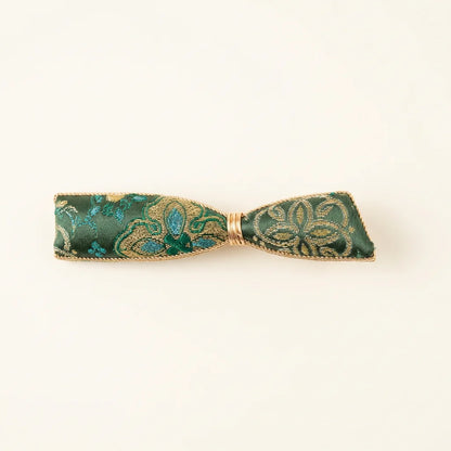Emerald Green Shu Brocade Bow Hair Clip — ivory background HERO handcrafted