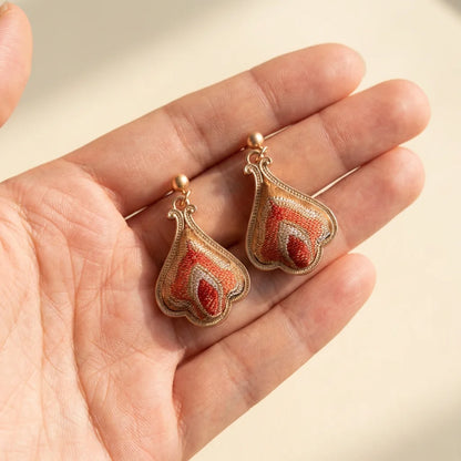 Teardrop silk brocade earrings size reference — hand scale approximately 3.5cm Shu Brocade